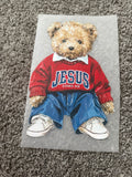 Red teddy bear Jesus loves you