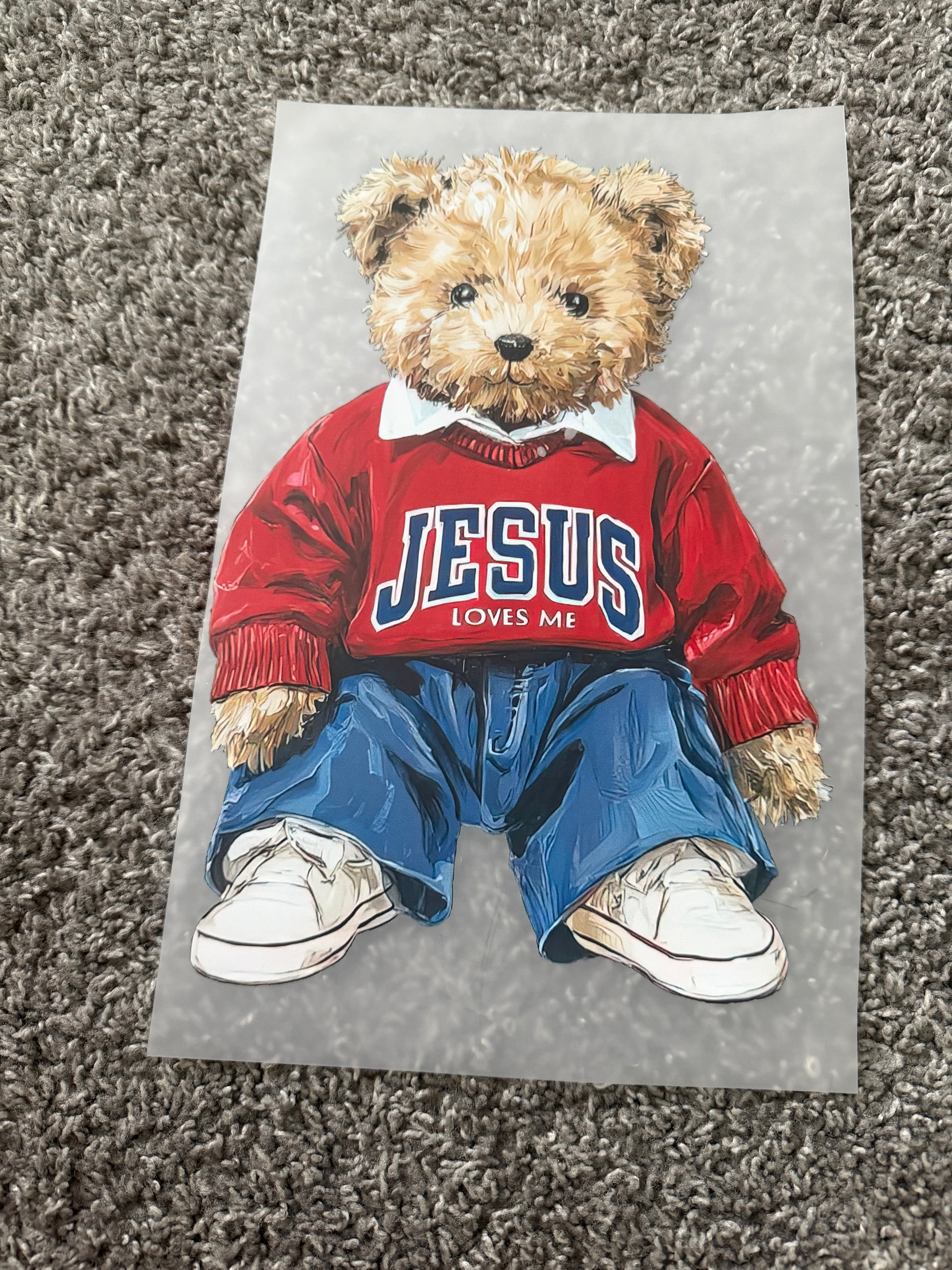 Red teddy bear Jesus loves you